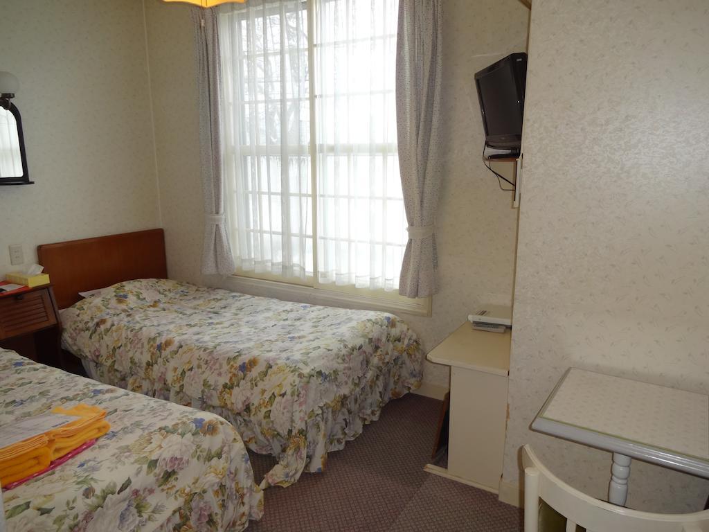 Ishiuchi Pension Bruges Minamiuonuma Zimmer foto